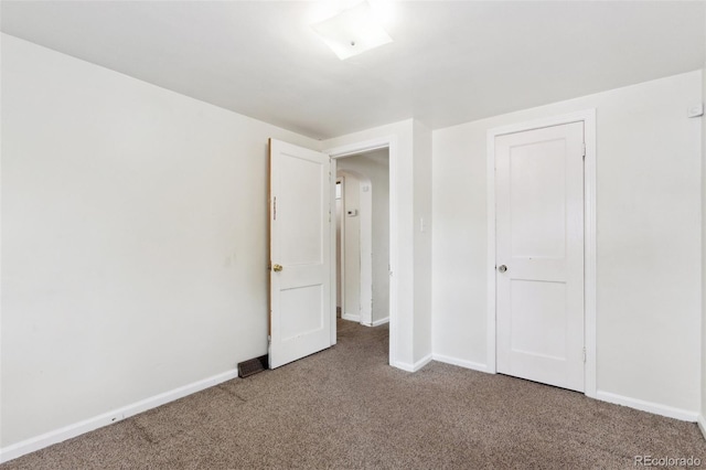 1175 Xanthia, Denver, CO 80220 - unfurnished bedroom featuring carpet and baseboards