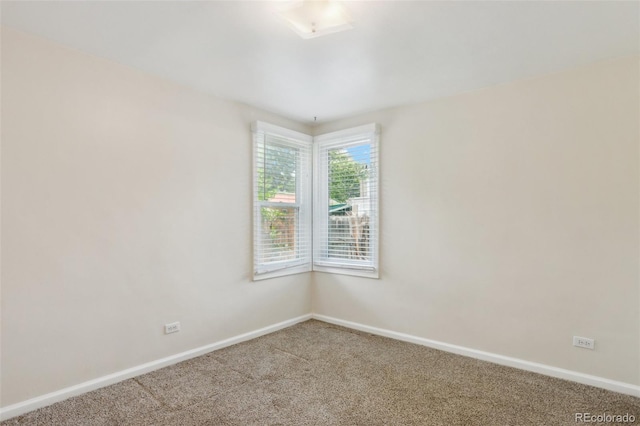 1175 Xanthia, Denver, CO 80220 - carpeted spare room featuring baseboards