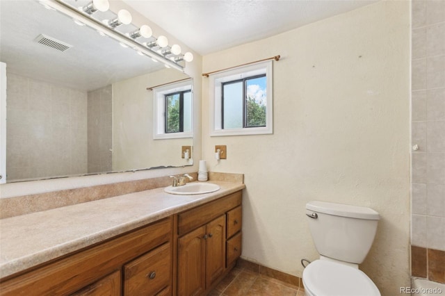 1175 Xanthia, Denver, CO 80220 - bathroom featuring vanity and tile patterned flooring