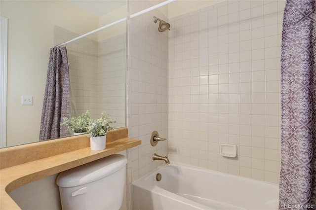 bathroom featuring toilet and shower / tub combo