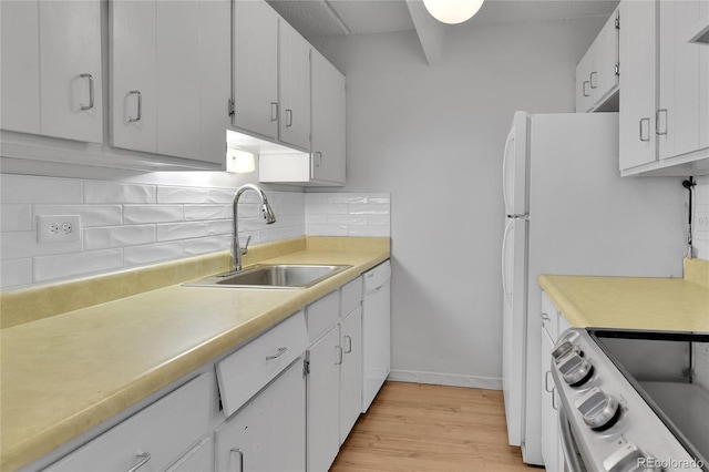 8060 E Girard Ave Unit 514, Denver, CO 80231 - kitchen featuring stainless steel electric range, backsplash, light wood-type flooring, dishwasher, and light countertops