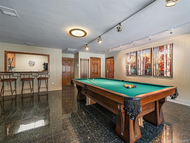 recreation room with dark tile floors, pool table, and rail lighting