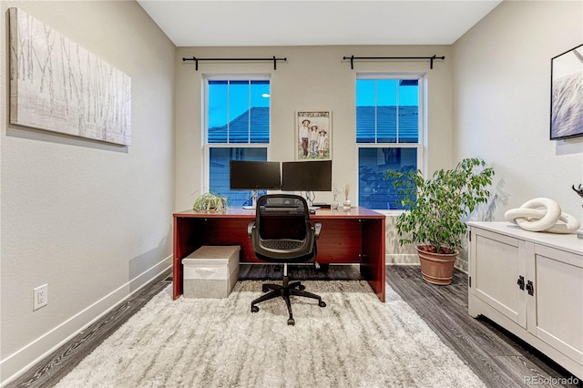 office with baseboards and wood finished floors