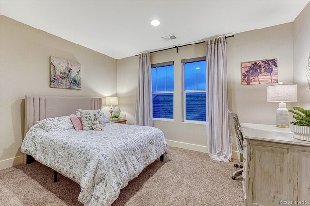 bedroom featuring carpet, visible vents, and baseboards