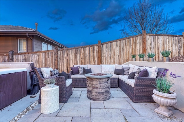 view of patio featuring a fenced backyard and an outdoor living space