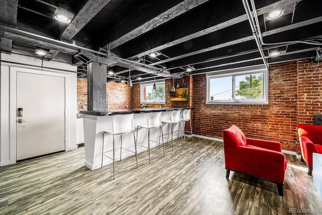 201 Lamkin St Unit 204, Pueblo, CO 81003 - bar with brick wall and wood finished floors