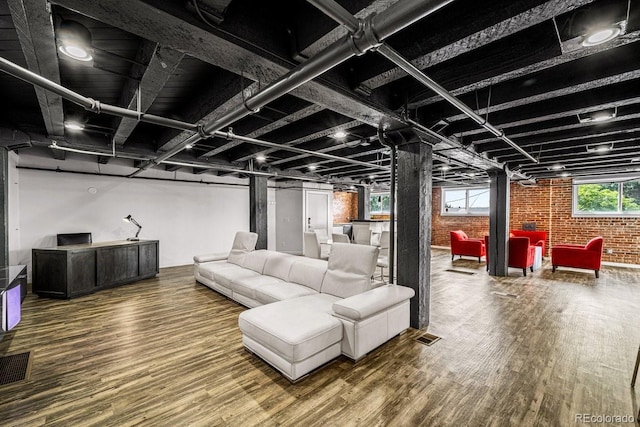 201 Lamkin St Unit 204, Pueblo, CO 81003 - below grade area featuring brick wall and wood finished floors