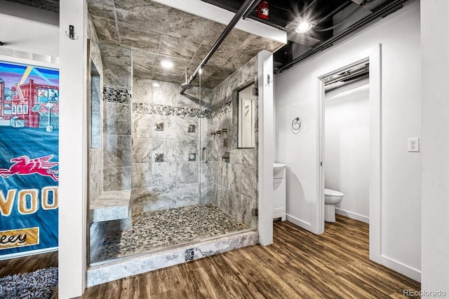 201 Lamkin St Unit 204, Pueblo, CO 81003 - full bathroom featuring a stall shower and wood finished floors