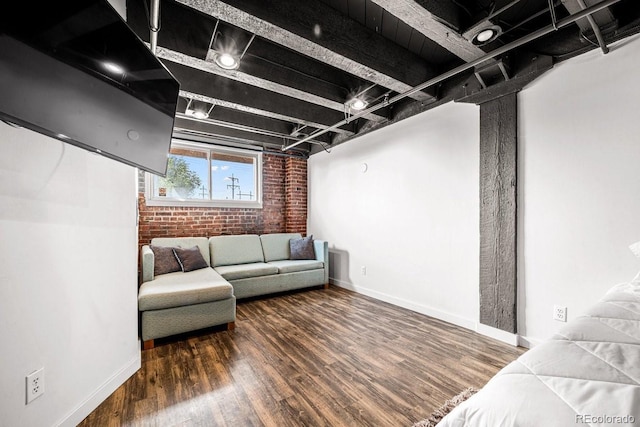 201 Lamkin St Unit 204, Pueblo, CO 81003 - living area with brick wall and wood finished floors
