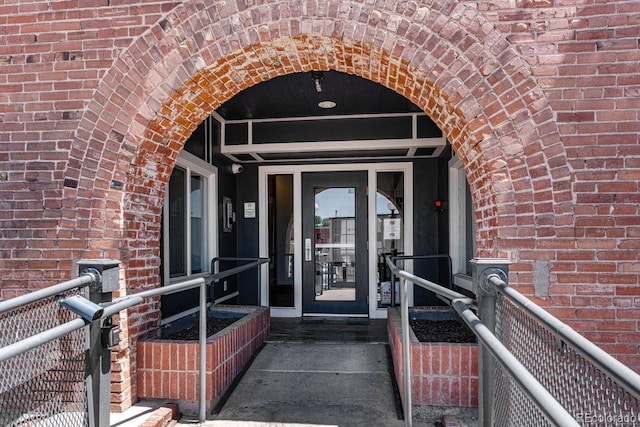 201 Lamkin St Unit 204, Pueblo, CO 81003 - view of exterior entry featuring brick siding
