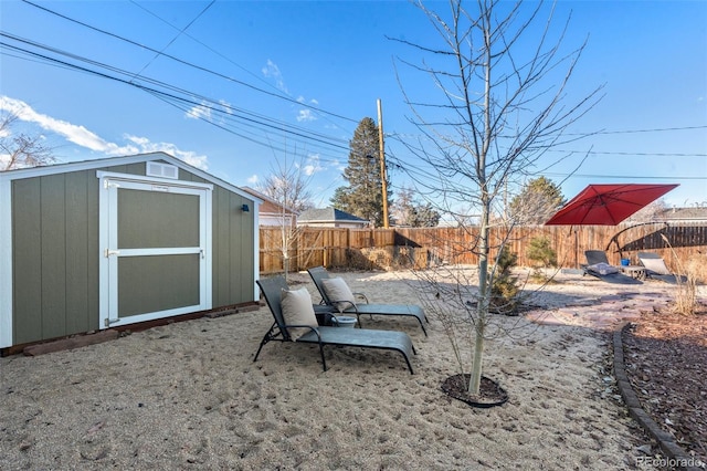 view of yard with a storage unit