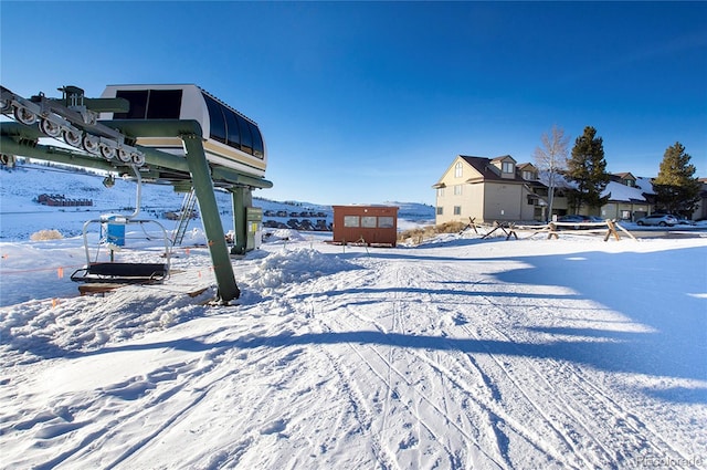 view of yard covered in snow