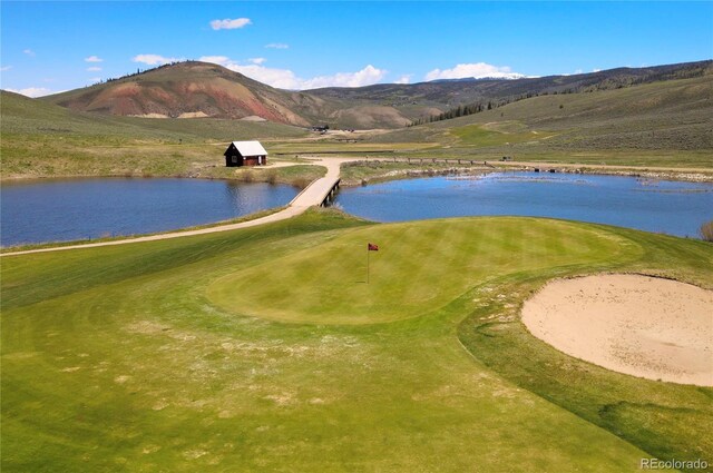 207 Lake Dr Unit 1203, Granby, CO 80446 - view of property's community with a water and mountain view and view of golf course