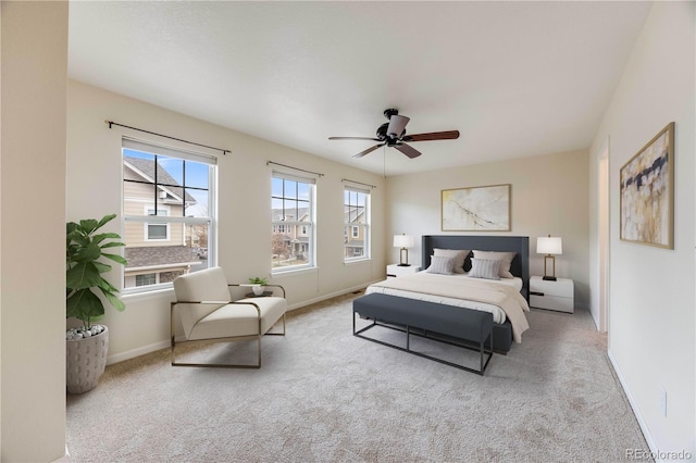 22813 E Briarwood Pl, Aurora, CO 80016 - carpeted bedroom with multiple windows and ceiling fan