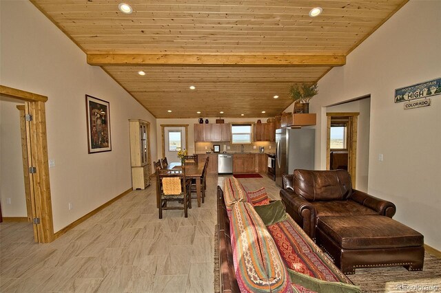 tiled living room with vaulted ceiling with beams, sink, and wooden ceiling