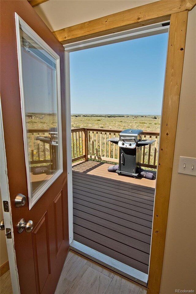 doorway featuring light hardwood / wood-style flooring