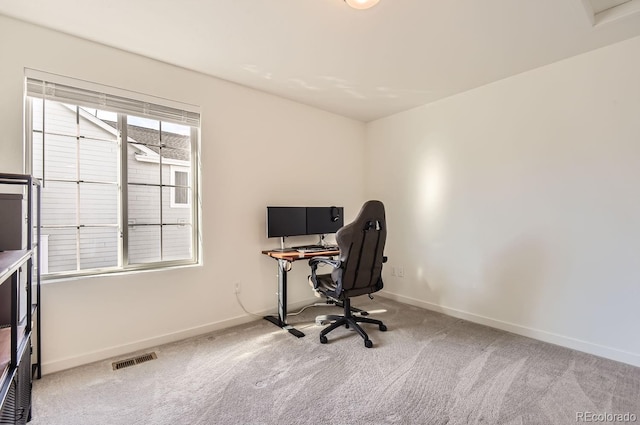 view of carpeted office space