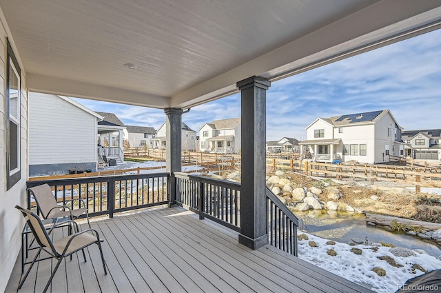 view of snow covered deck