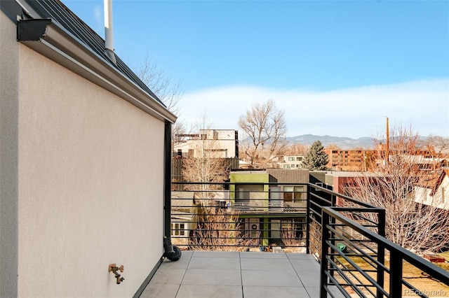 balcony featuring a mountain view