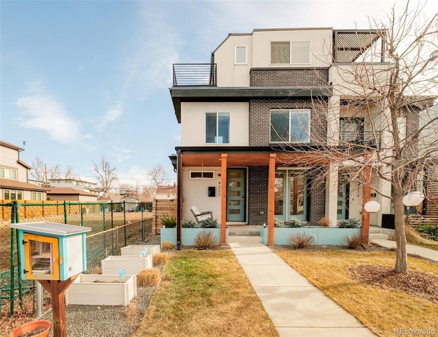 view of front of home with a front yard