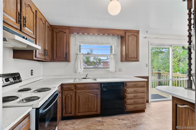 kitchen featuring range with electric stovetop, dishwasher, under cabinet range hood, a sink, and plenty of natural light