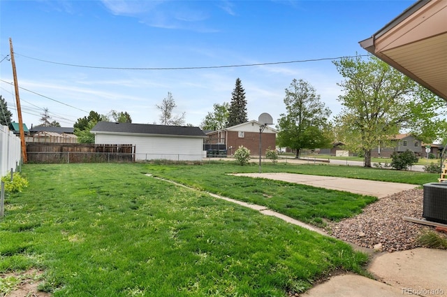 view of yard with central AC