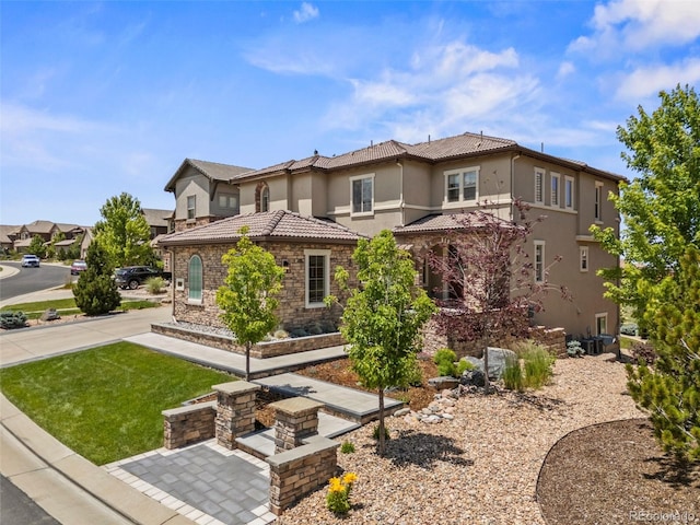 10757 Timberdash Ave, Highlands Ranch, CO 80126 - view of front of house featuring stucco siding and a tile roof