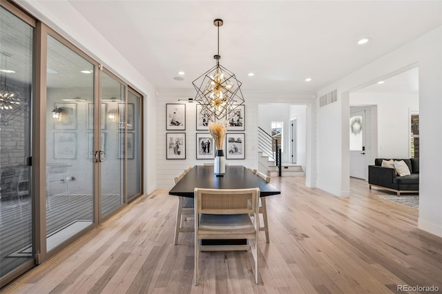 10757 Timberdash Ave, Highlands Ranch, CO 80126 - dining room featuring a chandelier, stairs, light wood-style floors, and recessed lighting