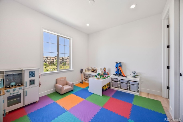 10757 Timberdash Ave, Highlands Ranch, CO 80126 - game room featuring recessed lighting and wood finished floors