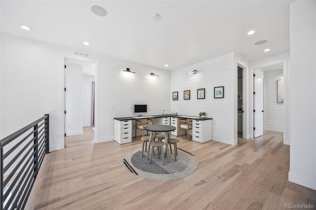 10757 Timberdash Ave, Highlands Ranch, CO 80126 - home office with light wood-style flooring and recessed lighting