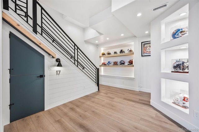 10757 Timberdash Ave, Highlands Ranch, CO 80126 - entryway with light wood-style flooring, stairway, and recessed lighting