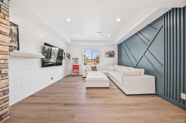 10757 Timberdash Ave, Highlands Ranch, CO 80126 - living room with light wood finished floors, recessed lighting, and a decorative wall