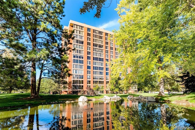 1900 E Girard Pl Unit 203, Englewood, CO 80113 - view of apartment building / complex featuring a water view
