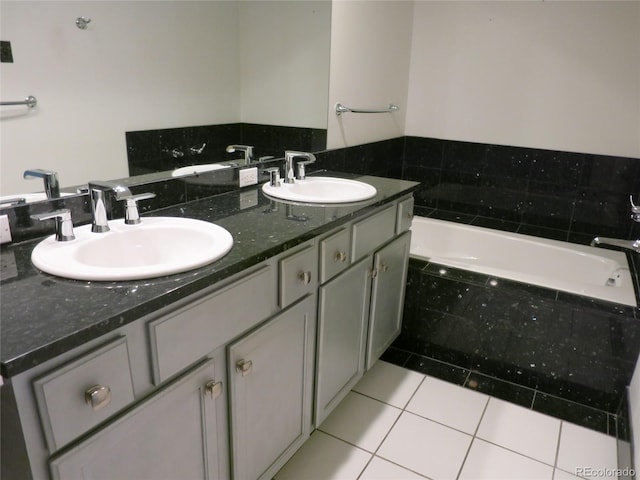 1900 E Girard Pl Unit 203, Englewood, CO 80113 - full bathroom with a bath, tile patterned flooring, and double vanity