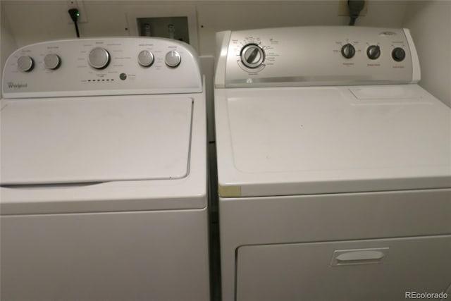 1900 E Girard Pl Unit 203, Englewood, CO 80113 - laundry area with washing machine and dryer