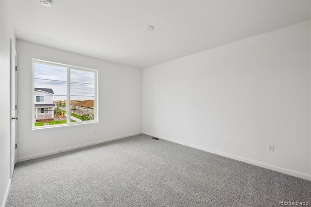 24790 E 39th Ave, Aurora, CO 80019 - empty room featuring carpet floors and baseboards