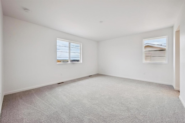 24790 E 39th Ave, Aurora, CO 80019 - carpeted empty room featuring a smoke detector and baseboards