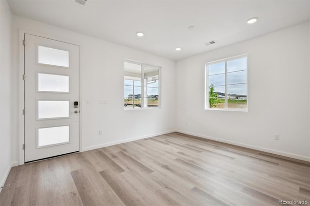 24790 E 39th Ave, Aurora, CO 80019 - entryway featuring wood finished floors, baseboards, and recessed lighting