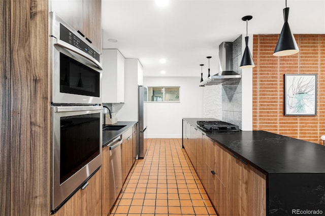 1330 Olive St, Denver, CO 80220 - kitchen with wall chimney exhaust hood, a sink, appliances with stainless steel finishes, baseboards, and dark countertops