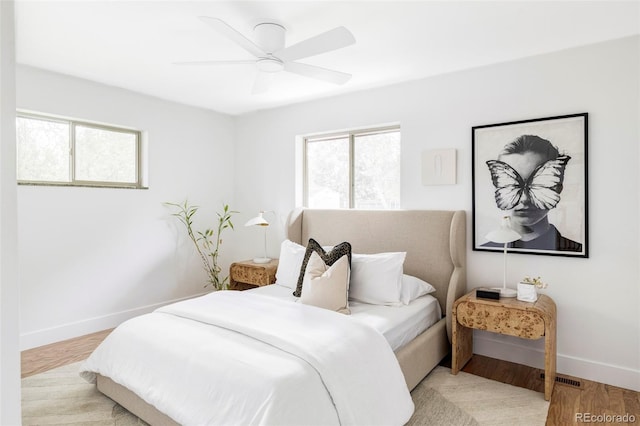 1330 Olive St, Denver, CO 80220 - bedroom with baseboards, wood finished floors, and ceiling fan