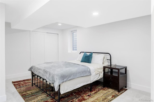 1330 Olive St, Denver, CO 80220 - carpeted bedroom featuring baseboards, recessed lighting, and a closet
