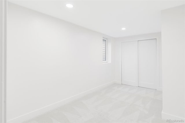 1330 Olive St, Denver, CO 80220 - unfurnished bedroom featuring light colored carpet, baseboards, recessed lighting, and a closet