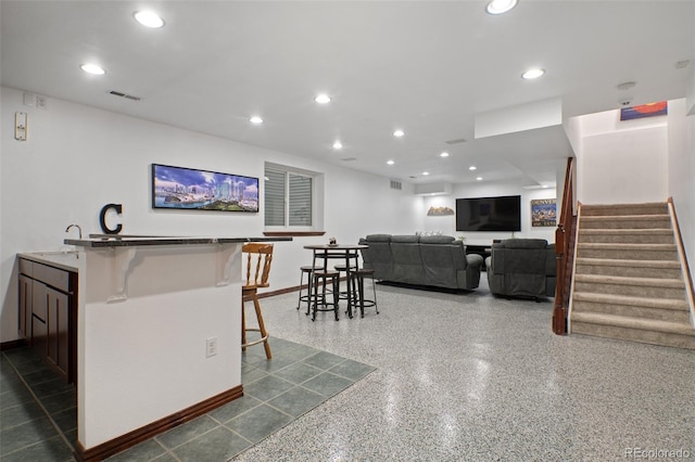 bar featuring recessed lighting, visible vents, baseboards, and stairs