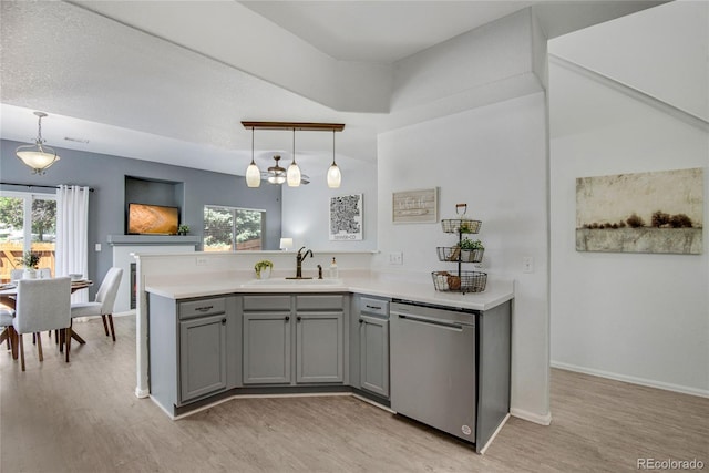 9080 Gale Blvd Unit 4, Thornton, CO 80260 - kitchen featuring dishwasher, a sink, gray cabinets, light wood finished floors, and plenty of natural light