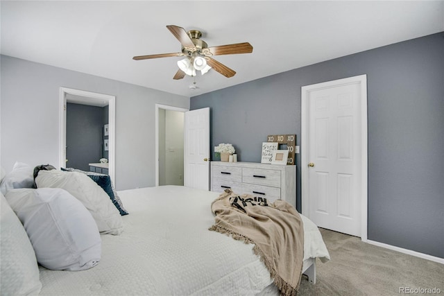 9080 Gale Blvd Unit 4, Thornton, CO 80260 - bedroom with light colored carpet, baseboards, and ceiling fan