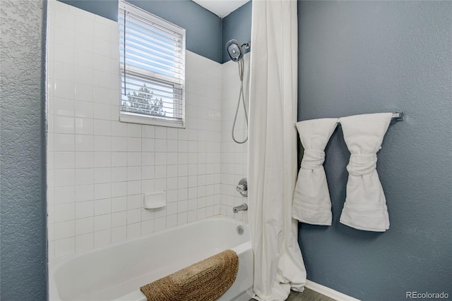 9080 Gale Blvd Unit 4, Thornton, CO 80260 - full bath with shower / bath combo with shower curtain and a textured wall