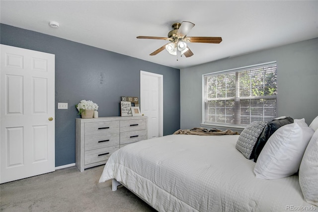 9080 Gale Blvd Unit 4, Thornton, CO 80260 - bedroom with light colored carpet, a ceiling fan, and baseboards