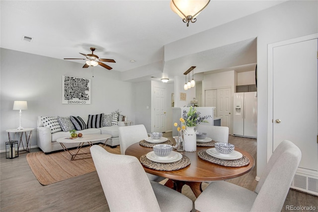 9080 Gale Blvd Unit 4, Thornton, CO 80260 - dining space with light wood-style floors, ceiling fan, and baseboards