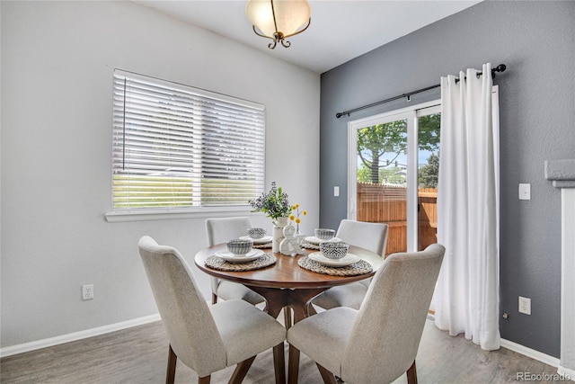 9080 Gale Blvd Unit 4, Thornton, CO 80260 - dining room with light wood-type flooring and baseboards