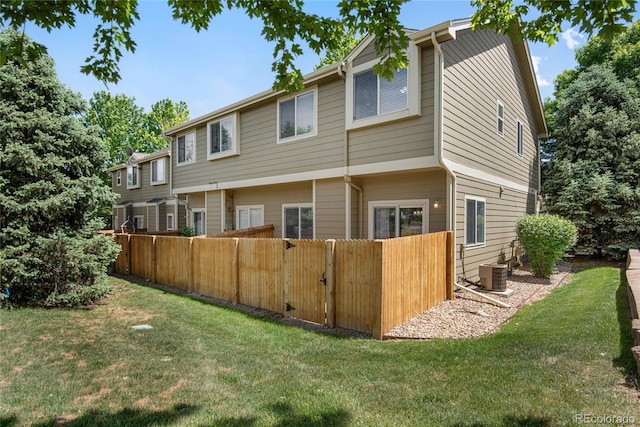 9080 Gale Blvd Unit 4, Thornton, CO 80260 - rear view of property with central air condition unit